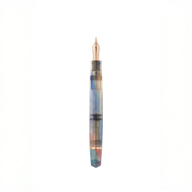 Multicolored fountain pen on a white background