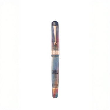 Multicolored fountain pen on a white background